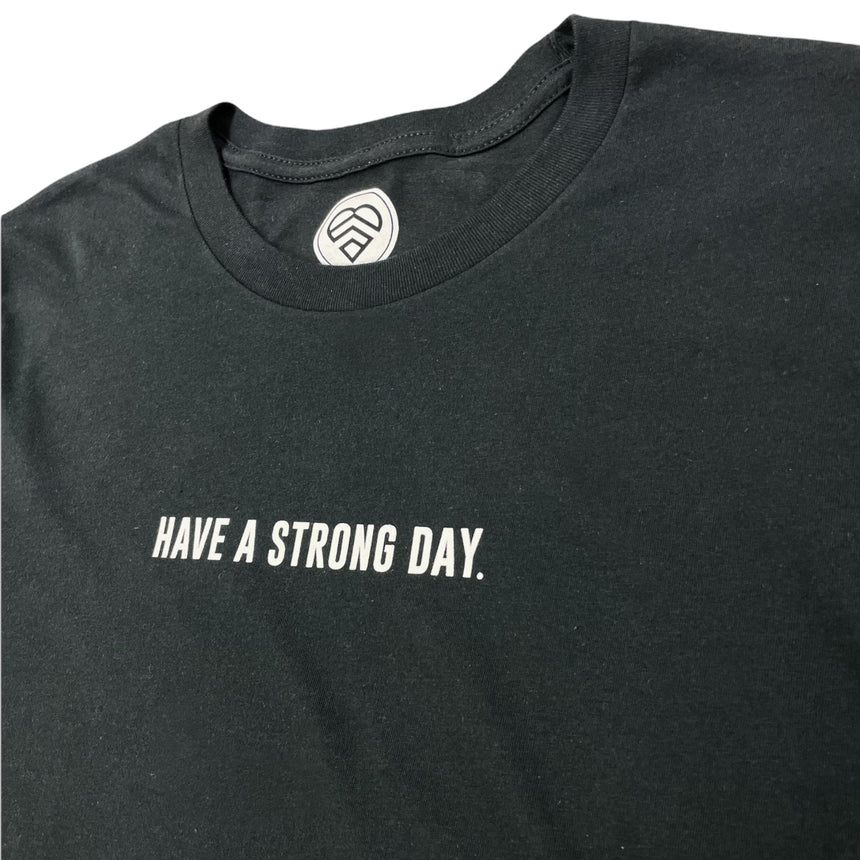 BLACK SLOGAN SHIRT | HAVE A STRONG DAY.
